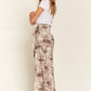 FRONT TIE SMOCKED HIGH WAIST TIE DYE PRINTED PALAZZO PANTS