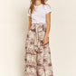 FRONT TIE SMOCKED HIGH WAIST TIE DYE PRINTED PALAZZO PANTS